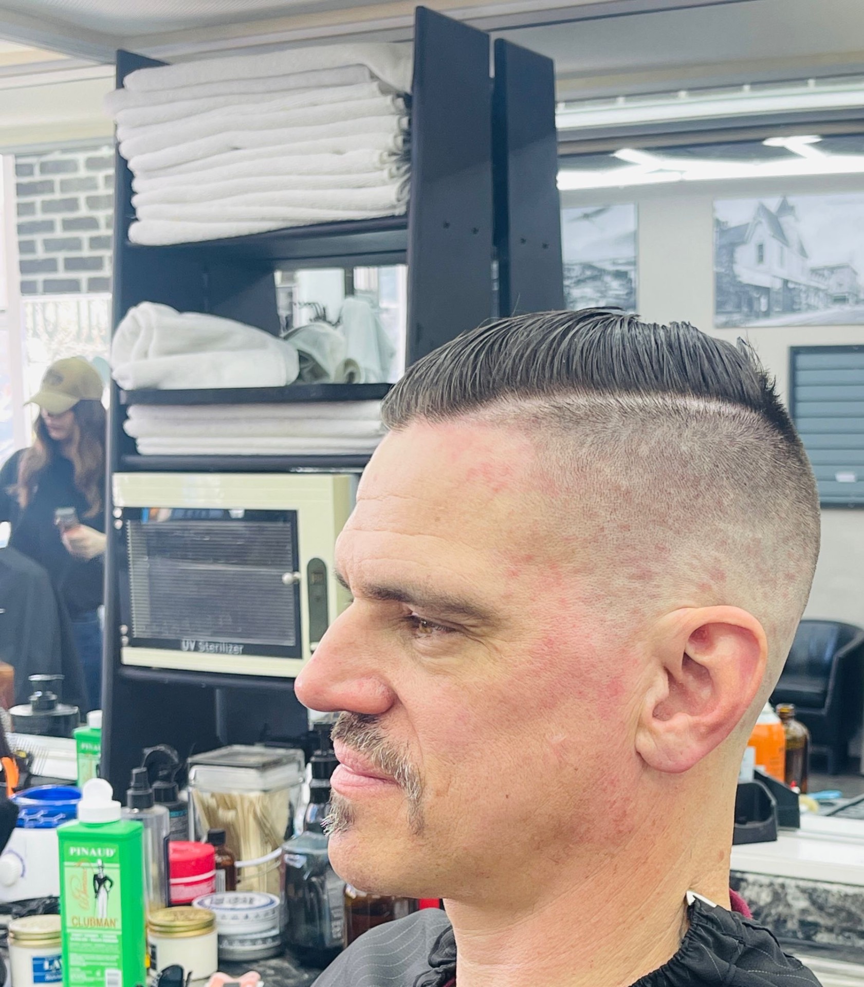 High and tight military-style haircut by Ariel — Continental Barbershop Kamloops