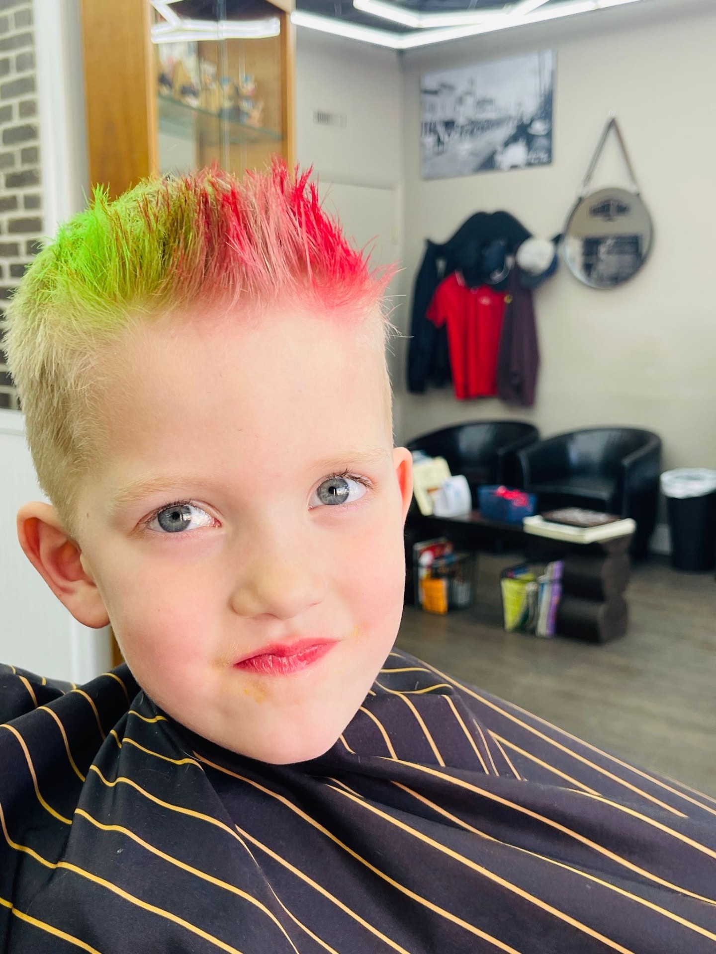 Slick side part with skin fade by Ariel at Continental Barbershop Kamloops