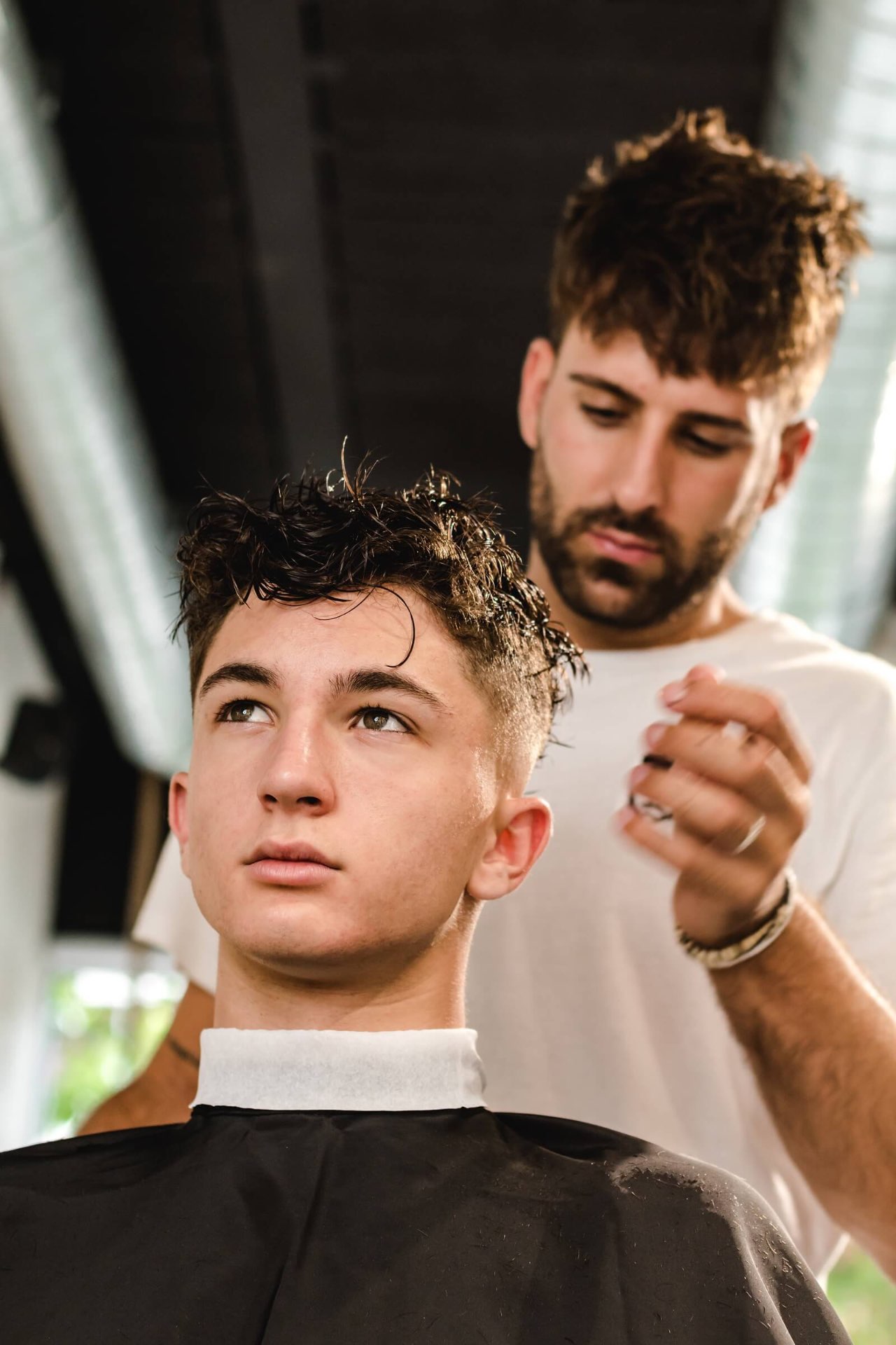 Long mullet with skin fade at Continental Barbershop Kamloops