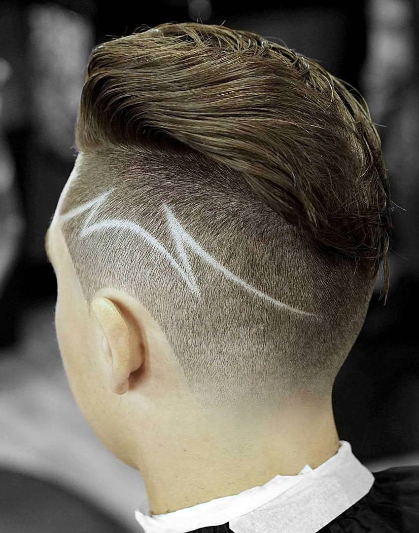 Braided long hair with skin fade in Kamloops